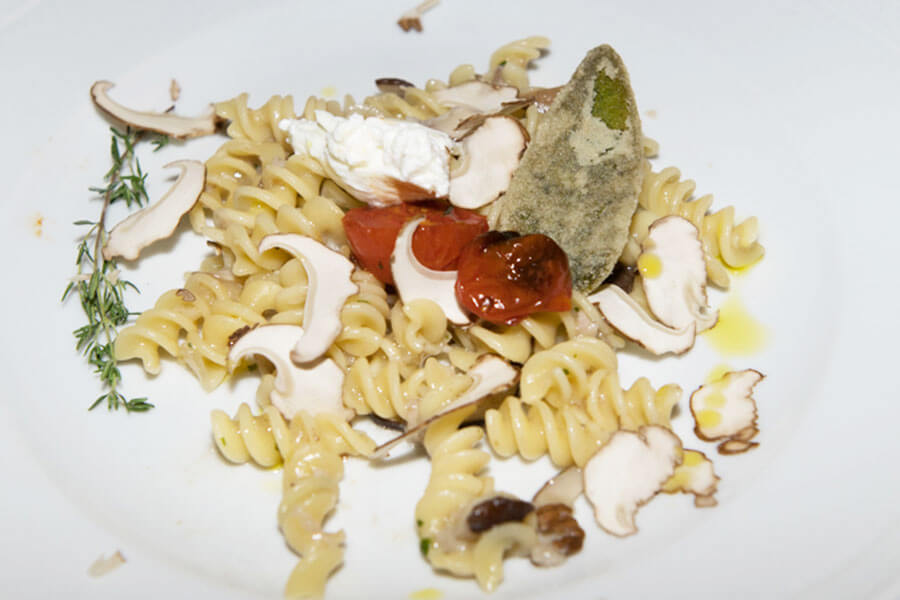 Fusilli with porcini mushrooms, cherry tomatoes and burrata